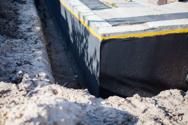 Professional Waterproofing technician working in Hanover, MD